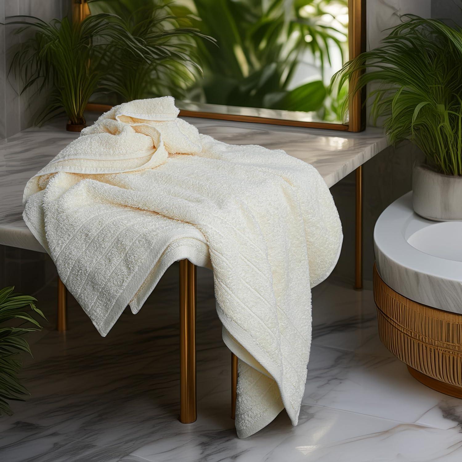 imageTens Towels Pack of 4 Extra Large Bath Towels 30 x 60 Inches 100 Cotton Larger ampamp Lighter Weight Quicker to Dry Super Soft and Absorbent Perfect for Bathroom Dark GreyCream