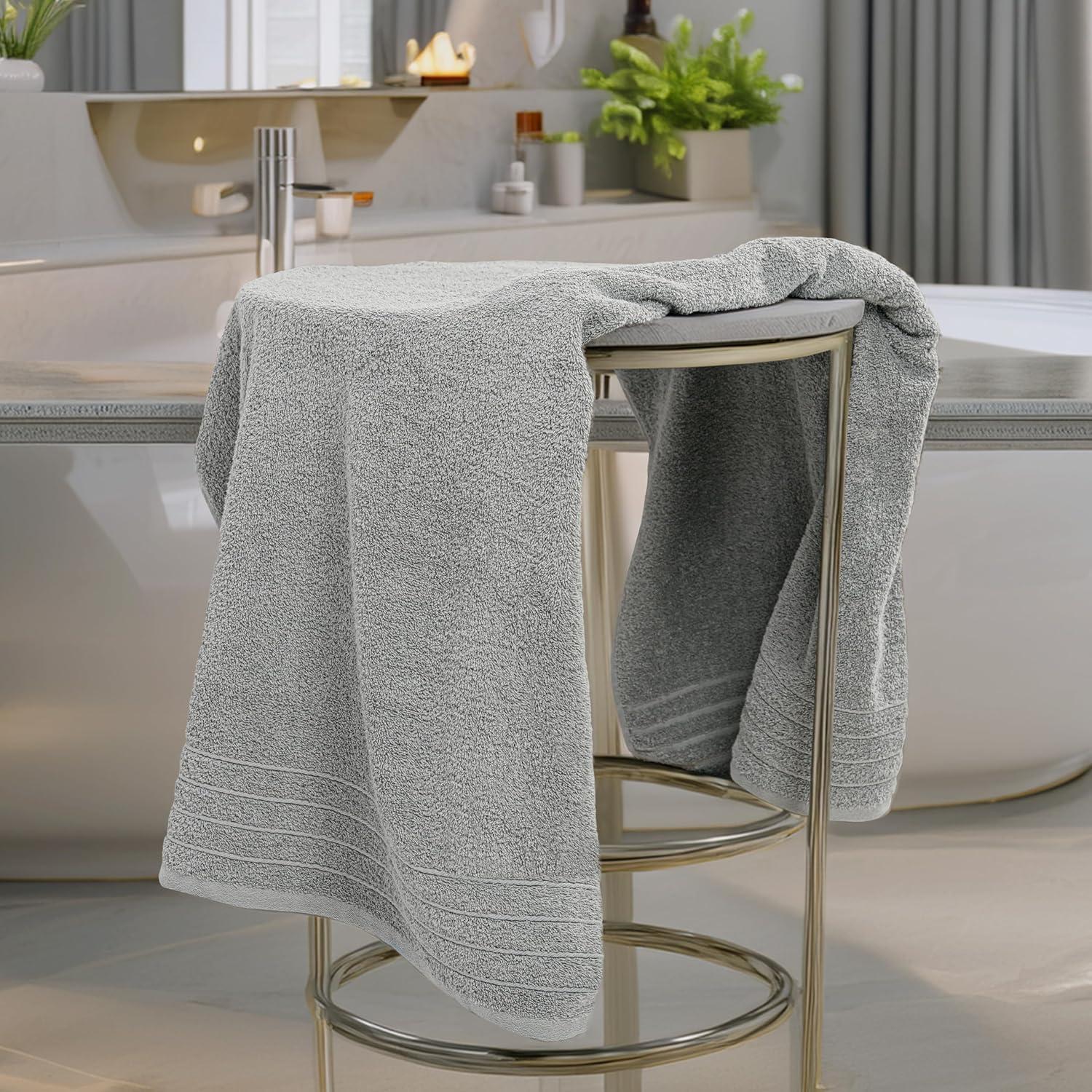 imageTens Towels Pack of 4 Extra Large Bath Towels 30 x 60 Inches 100 Cotton Larger ampamp Lighter Weight Quicker to Dry Super Soft and Absorbent Perfect for Bathroom Dark GreyCool Grey