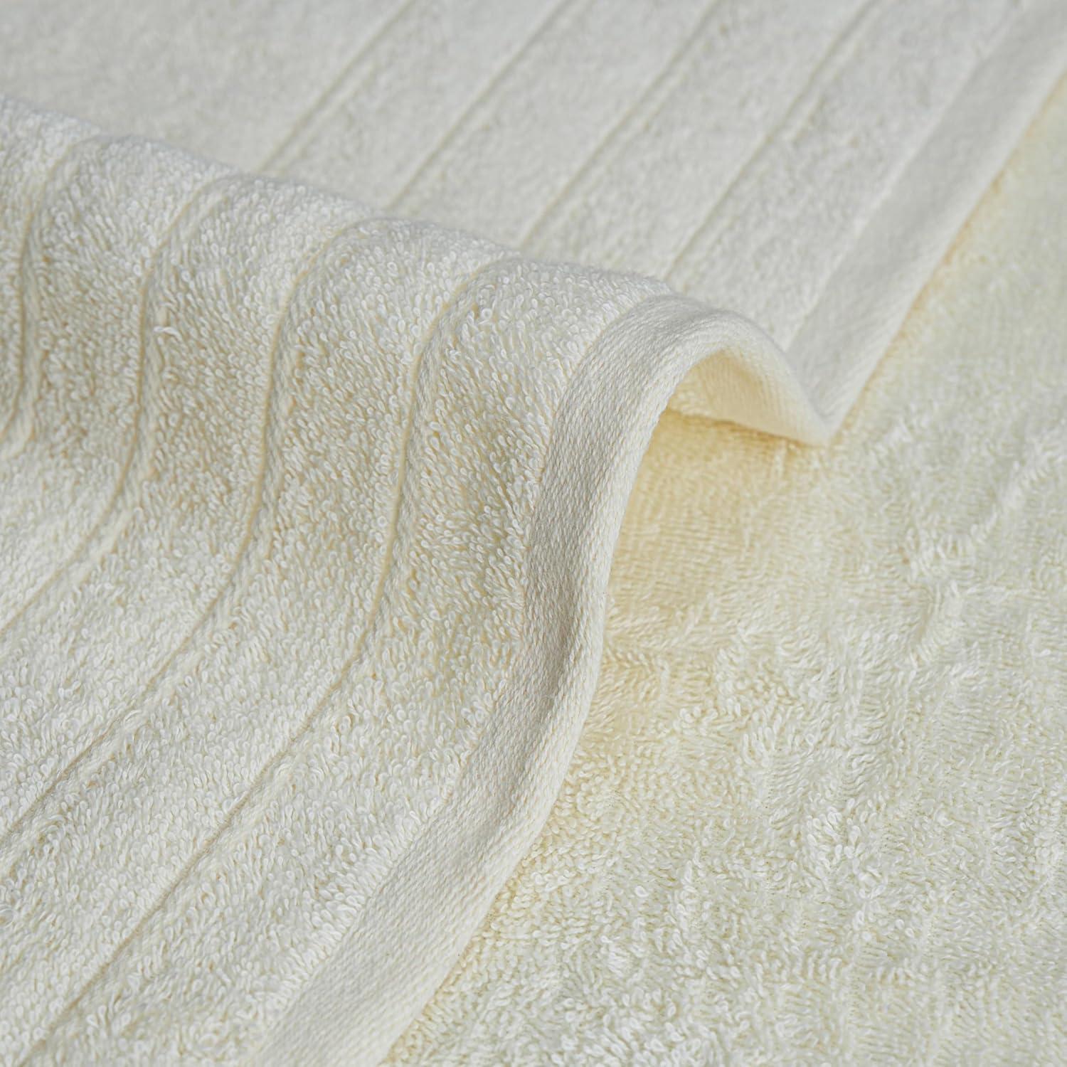 imageTens Towels Pack of 4 Extra Large Bath Towels 30 x 60 Inches 100 Cotton Larger ampamp Lighter Weight Quicker to Dry Super Soft and Absorbent Perfect for Bathroom Dark GreyCream