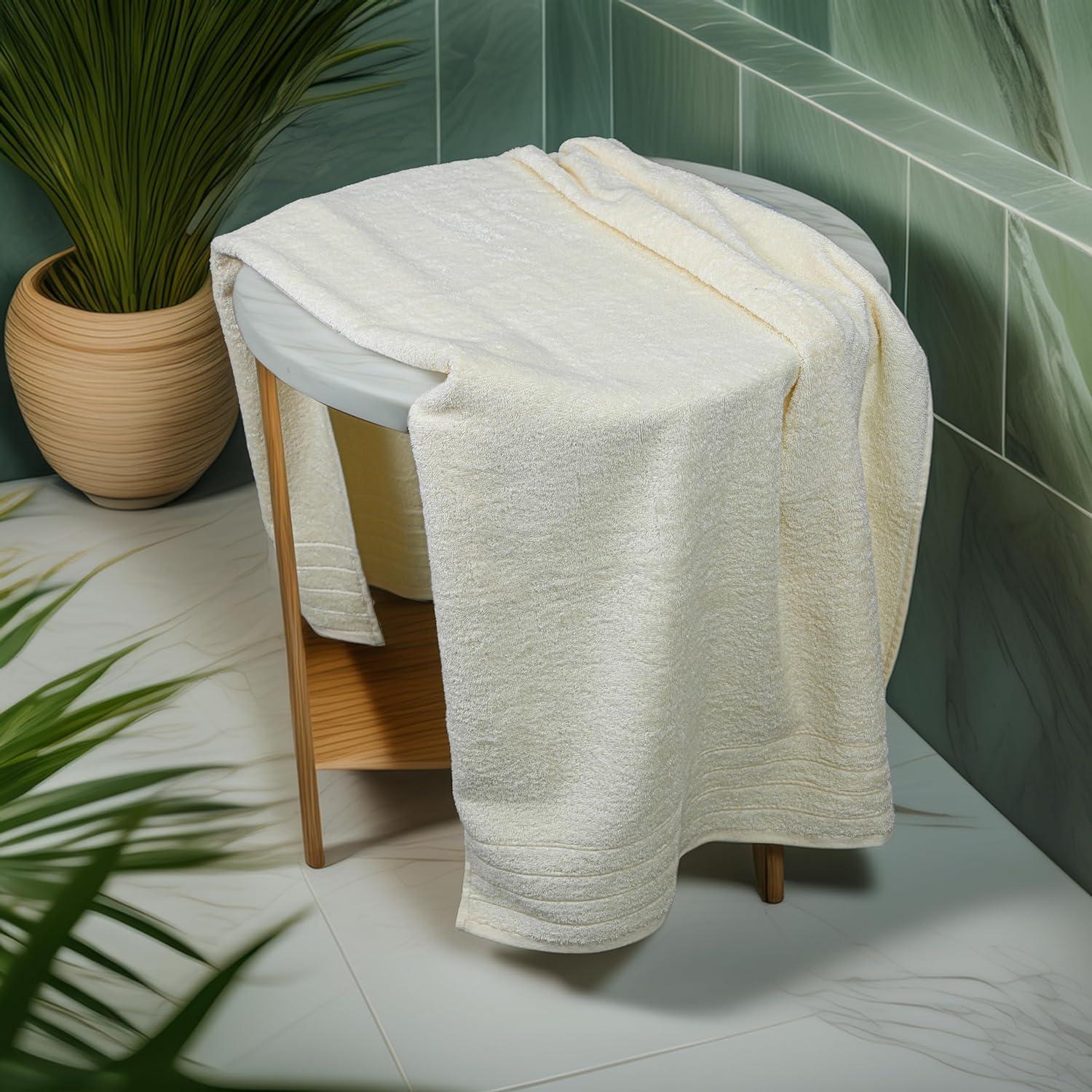 imageTens Towels Pack of 4 Extra Large Bath Towels 30 x 60 Inches 100 Cotton Larger ampamp Lighter Weight Quicker to Dry Super Soft and Absorbent Perfect for Bathroom Dark GreyCream