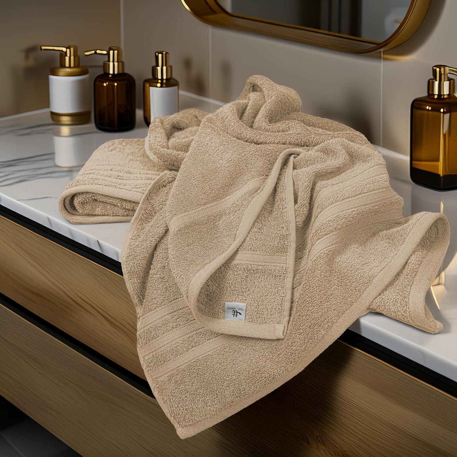 imageTens Towels Pack of 4 Soft Bath Towels 100 Cotton 27 x 54 Inches Lightweight ampamp QuickDry Ideal for Daily Bathroom Use Practical ampamp Comfortable NavyBeige