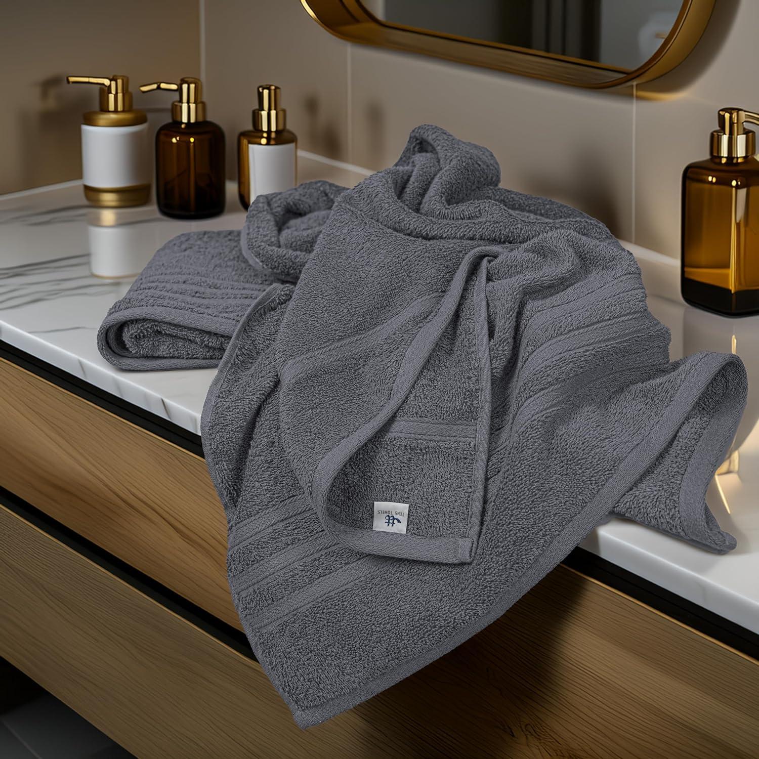 imageTens Towels Pack of 4 Soft Bath Towels 100 Cotton 27 x 54 Inches Lightweight ampamp QuickDry Ideal for Daily Bathroom Use Practical ampamp Comfortable Dark Grey